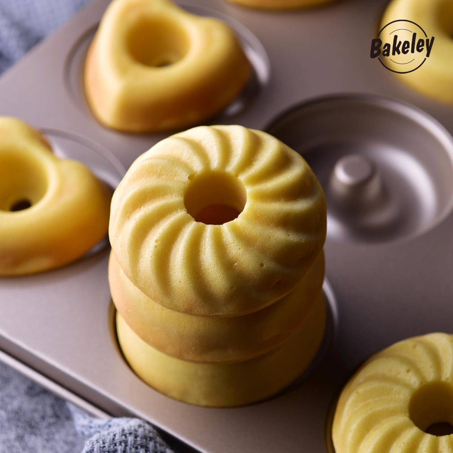 Donut Mold Cake Pan, 12-Cavity Non-Stick Ring Doughnut Bakeware for Oven Baking (Champagne Gold)